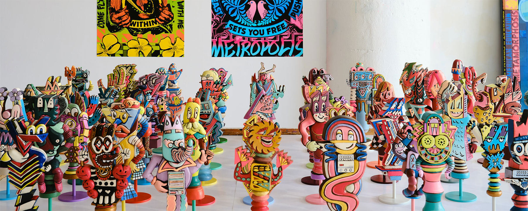 A collection of hand carved and painted figures designed and produced for Herman Miller Gaming by FAILE and Deluxx Fluxx.