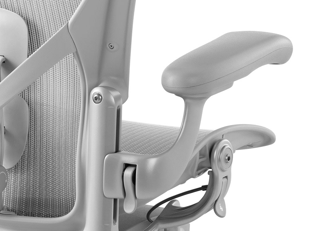 The armrest of a Mineral-coloured Herman Miller Aeron