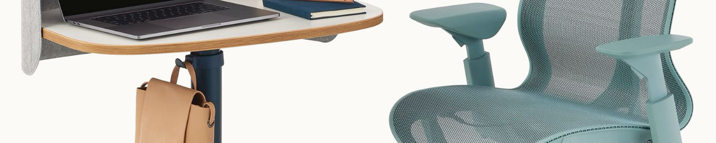 A Herman Miller Cosm chair and Passport desk with a small leather bag attached to the table via a bag hook.