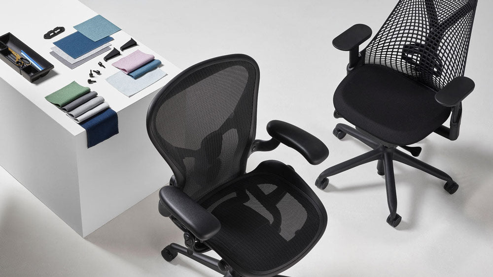 Photo graph of Aeron & Sayl office chairs in black that contain recycled ocean plastic