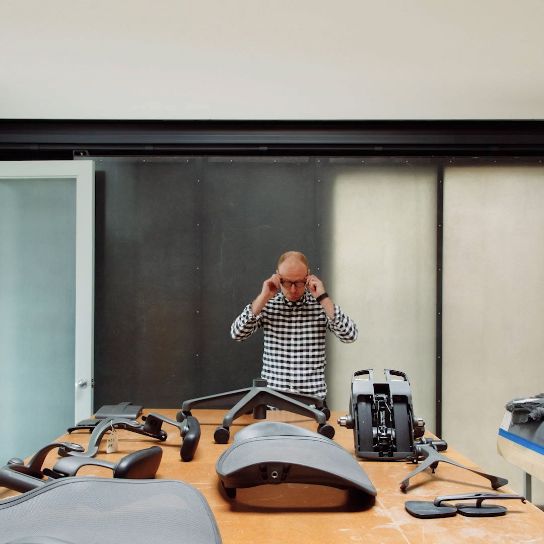 Video showing a Herman Miller Aeron chair being build from table cover in components to complete chair